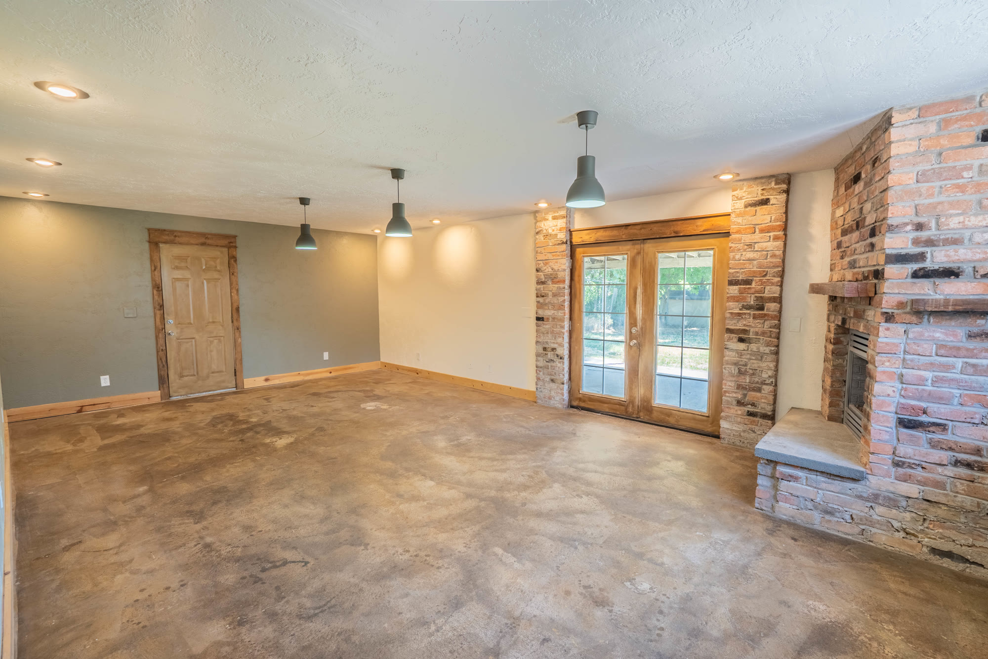 Main-level family room with doors to the backyard